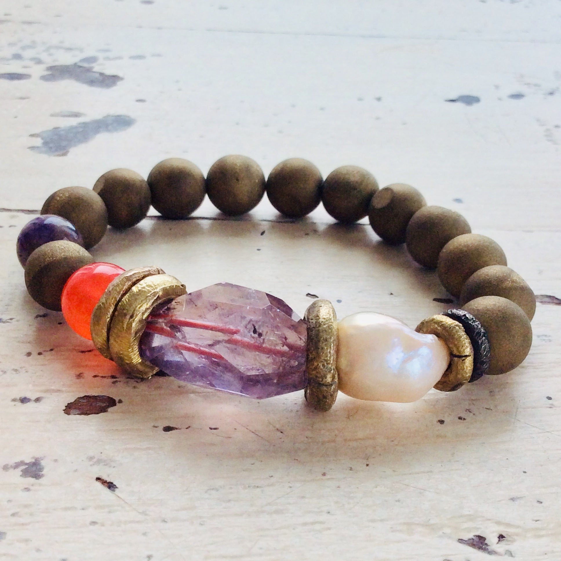 Amethyst baroque pearl bracelet showcasing handcrafted bead arrangement and organic textures