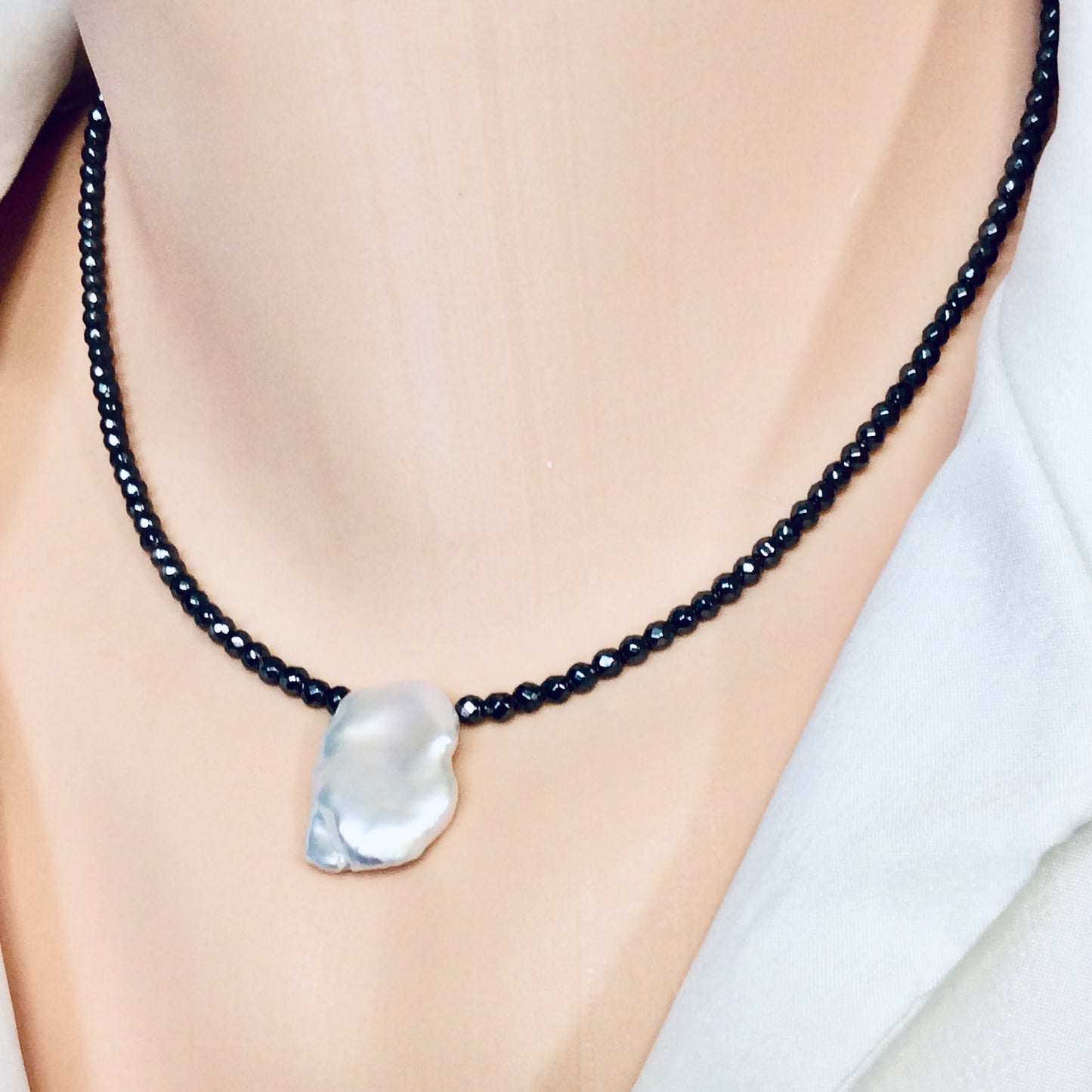 Hematite baroque pearl short necklace close-up highlighting high-luster freshwater pearl