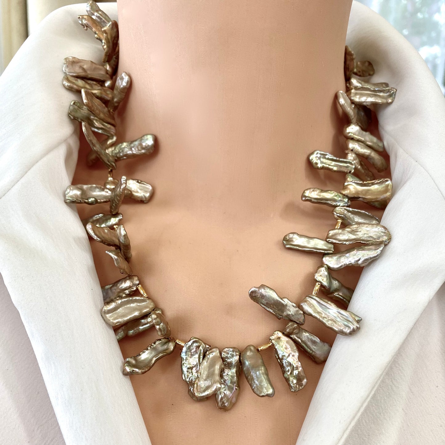 Champagne pearl necklace close-up worn, statement Biwa keshi pearls with bamboo-style gold details