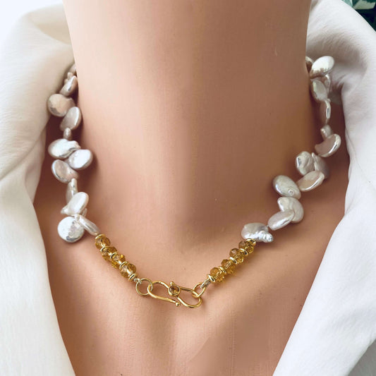 Keshi pearl necklace featuring AAA-quality freshwater pearls and citrine beads, showcased on a mannequin.